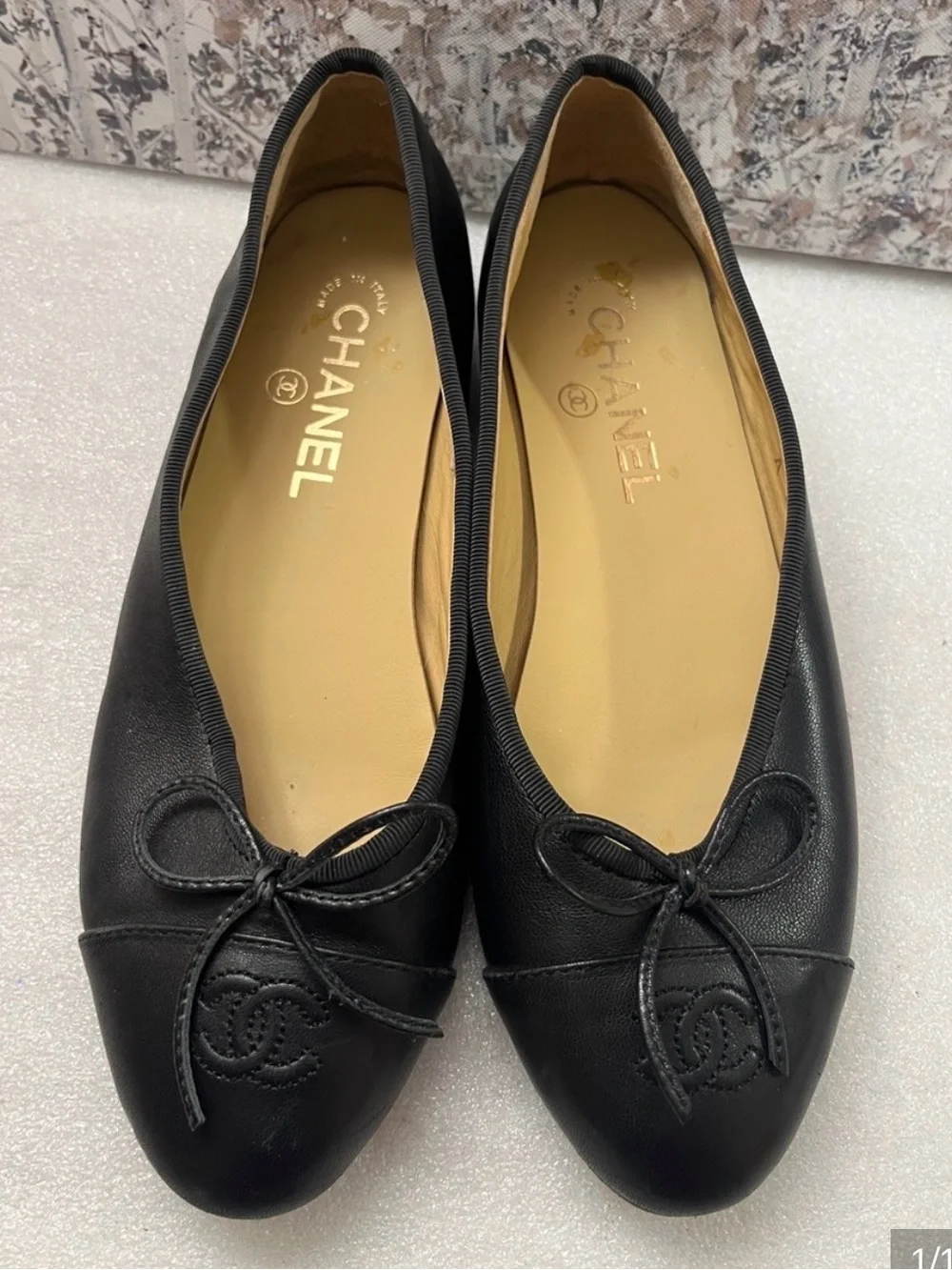 CHANEL Black Leather Ballet Flats with Bow and CC Motif